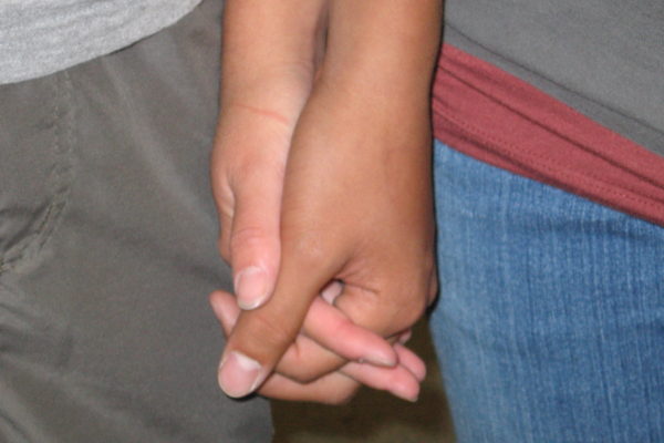 Couples who show affection in simple ways like holding hands have more positive perspective on their relationships.